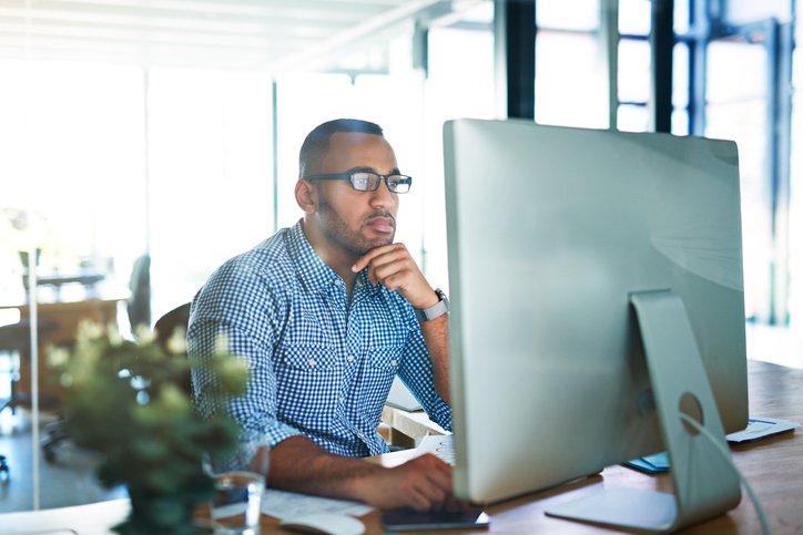 An investor researches alternative investment management strategies.