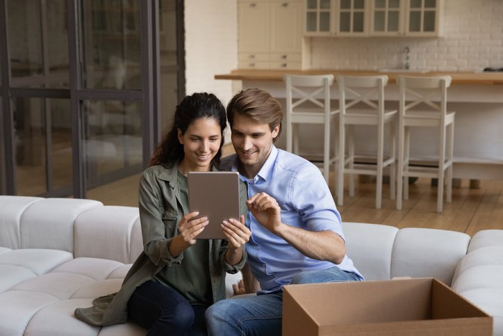 A couple researching ways to build wealth with home equity.